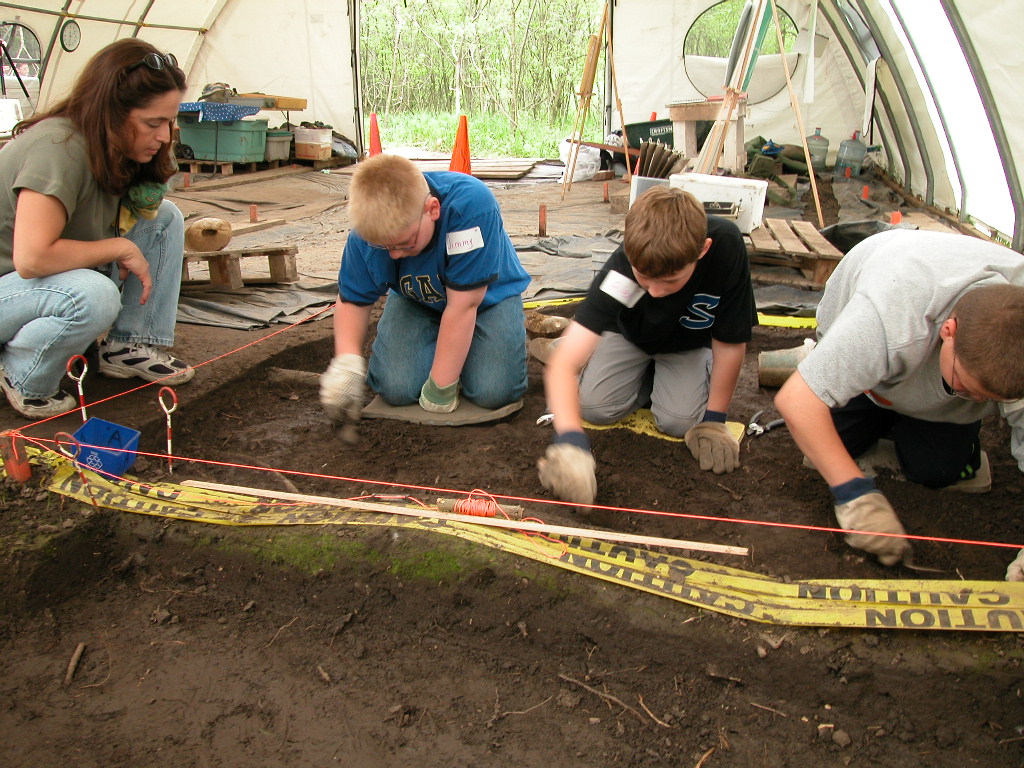 A few students are hard at work, looking for buried treasures